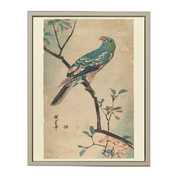 Green Parrot on a branch with red flowers