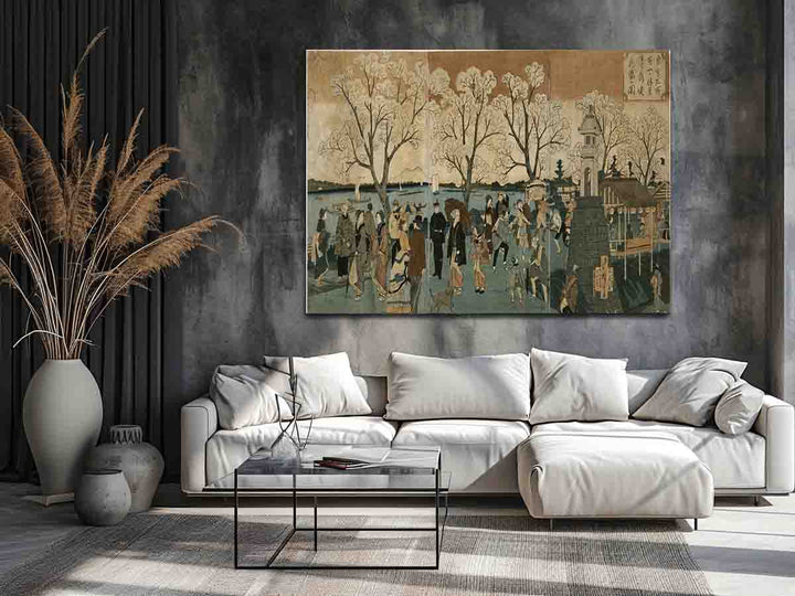Japanese triptych print showing Japanese and foreign people walking along the Sumida River among cherry trees in full bloom