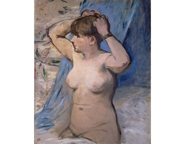 Femme nue se coiffant 
